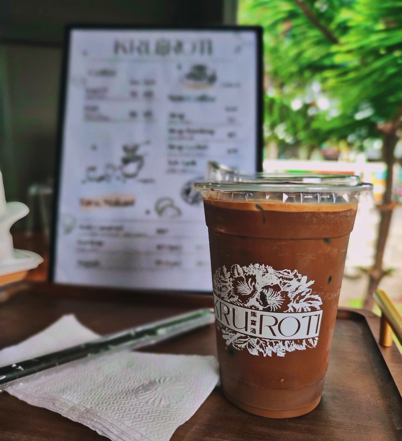 Iced kopi on a tray at the Kruroti counter