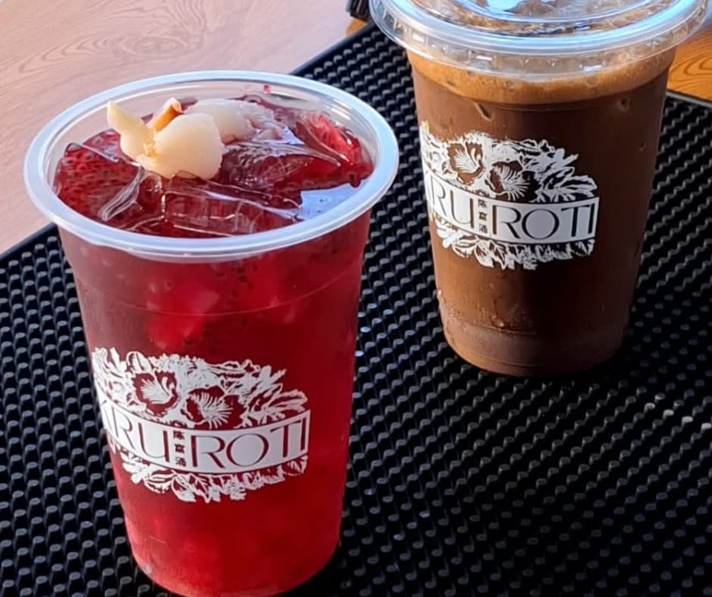 Sirap lychee and iced kopi in Kruroti cups